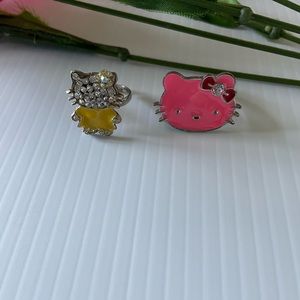 Pink Hello Kitty face, Rhinestone yellow Hello Kitty adjustable band - 2 rings